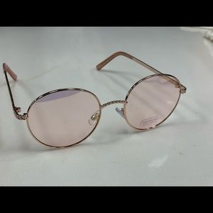 Pink tint round gold frame sunglasses